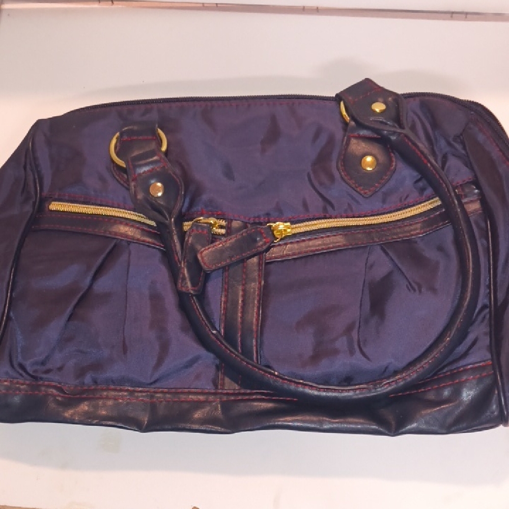 Elegant Blue Women's Bag with Red Trim